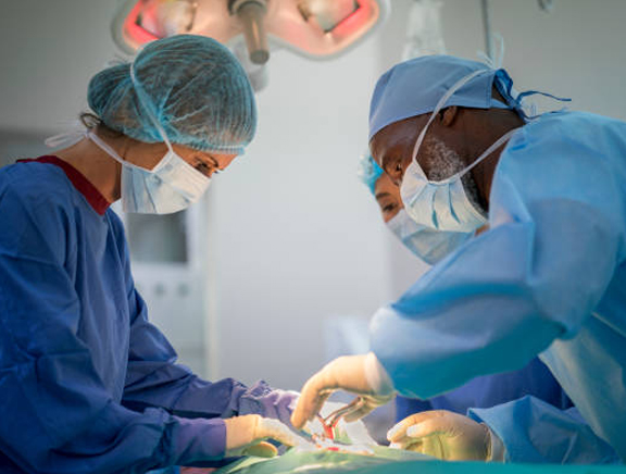  Surgeons Performing a Surgery